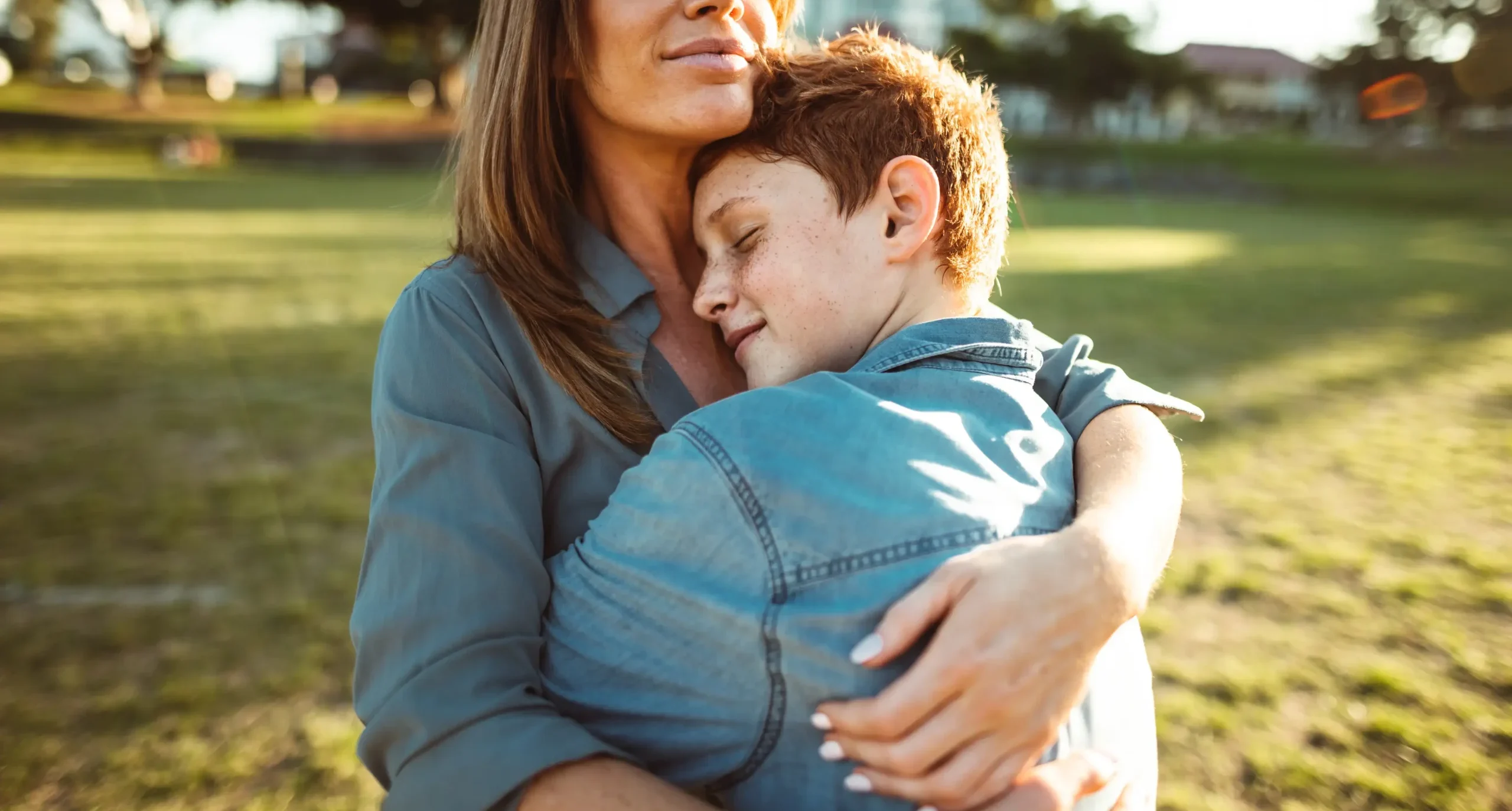 mom embracing son